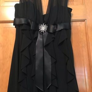 Black mini length cocktail dress. Worn once.
